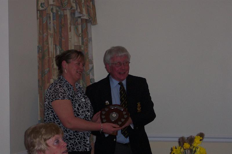 Trixie recieving ladies bowling trophy from David Chatterton.JPG